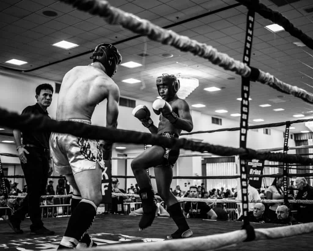 Kickbokser feinting an attack in the ring