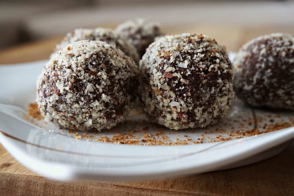 Raw energy balls with coconut topping