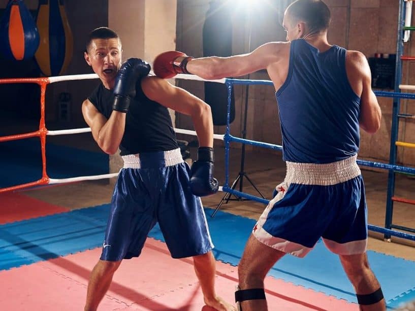 Boxer dodging a jab